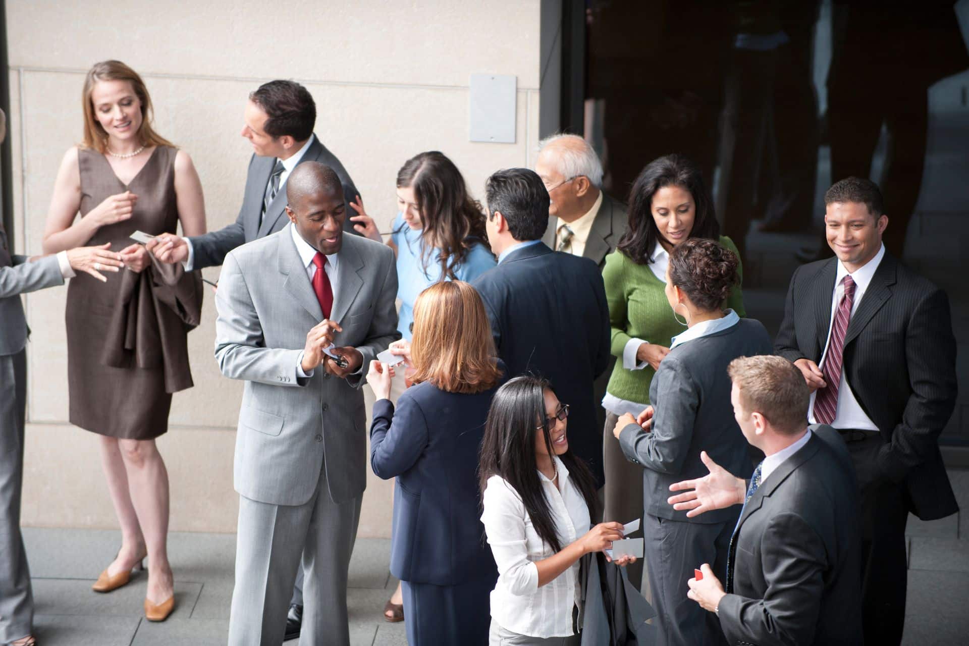networking event - The Sales Vault - The Sales Vault A group of people at a networking event.